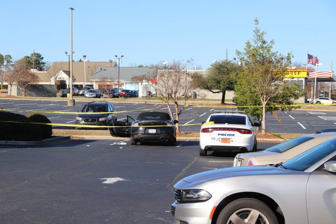 Fayetteville police investigate Tuesday after a man showed up at Fred Chason’s Grandsons Buffet restaurant with a bullet wound in his neck. [Thomas Honeycutt/Contributed]