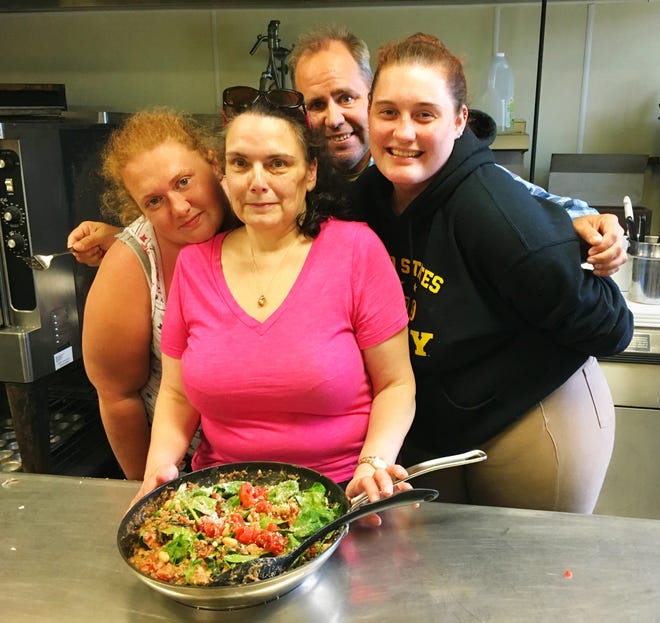 Participants in a LivFit class at the Martin Luther King Center learn how to make healthy meals. [PHOTO COURTESY KRISTIN NIESSINK]