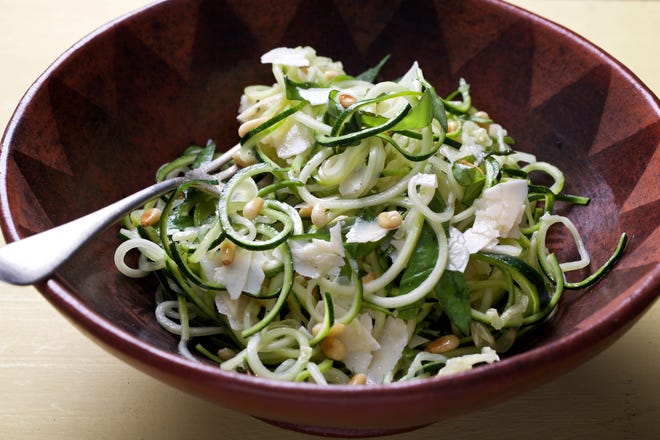 Zucchini is made into noodles using a spiralizer. [Photo by Deb Lindsey for The Washington Post.]