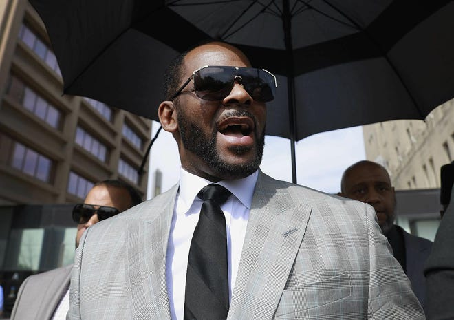 In this June 6 file photo, musician R. Kelly leaves the Leighton Criminal Court building in Chicago. Lifetime is readying a follow-up series to "Surviving R. Kelly" called “Surviving R. Kelly Part II: The Reckoning” with one major difference: This time, R Kelly will be behind bars when it airs. [AMR ALFIKY/ASSOCIATED PRESS]