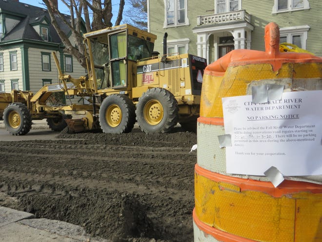Work crews were back out on Rock Street Thursday, Jan. 2, 2020, to prepare the street for repaving following Wednesday's water main break. [Herald News photo by Peter Jasinski]