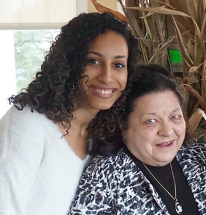 Barbara Stieglitz with her granddaughter, Stephanie, at a farewell party.