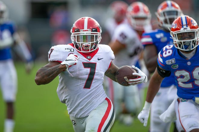 Georgia running back D'Andre Swift chose to forgo his senior season for the NFL on Friday, a decision widely expected by the junior back. [Photo/Ken Ward, Contributor Athens Banner-Herald]
