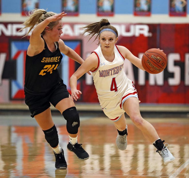 Monterey's Taysha Rushton (4) dribbles the ball down the court past Amarillo's Ansleigh Westlake (24) during a District 3-5A game Friday at Monterey High School. [Brad Tollefson/A-J Media]