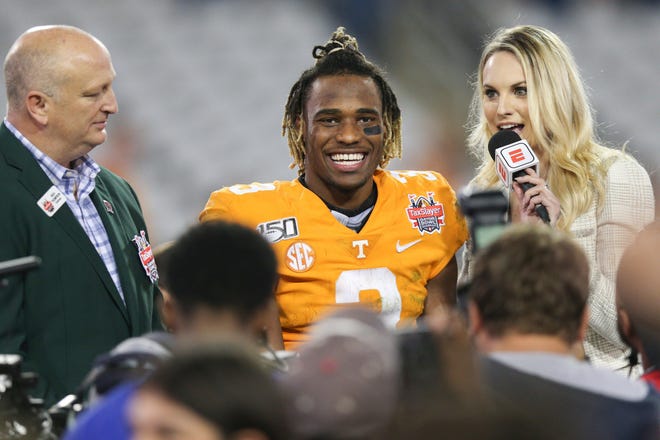 Tennessee freshman Eric Gray reacts after receiving the Gator Bowl MVP for Thursday night’s win against Indiana. Gray recovered an onside kick and scored the go-ahead touchdown three plays later. [James Gilbert/For the Times-Union]