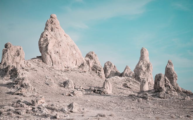 Geologists say the Trona Pinnacles near Ridgecrest were formed thousands of years ago when Searles Lake dried up. Some of the tufa spires reach 140 feet in height. [PHOTO COURTESY OF JOHN R. BEYER]