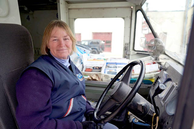 “There are so many good people we’ve met and it’s always been so nice being a part of it,” said Debbi Wirtz on her last day as a carrier after 31 years. Photo by Logan Kahler/Boone News-Republican.