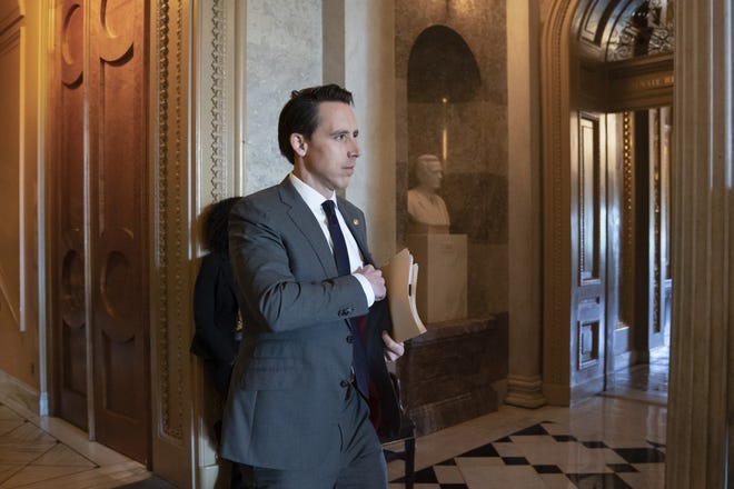 Sen. Josh Hawley, R-Mo., leaves the Senate floor in June after presiding over a roll call on an amendment to require Congressional approval before President Donald Trump could order military strikes against Iran. Hawley has filed a proposal to change Senate rules to dismiss the articles of impeachment against President Donald Trump. [Scott Applewhite/Associated Press]