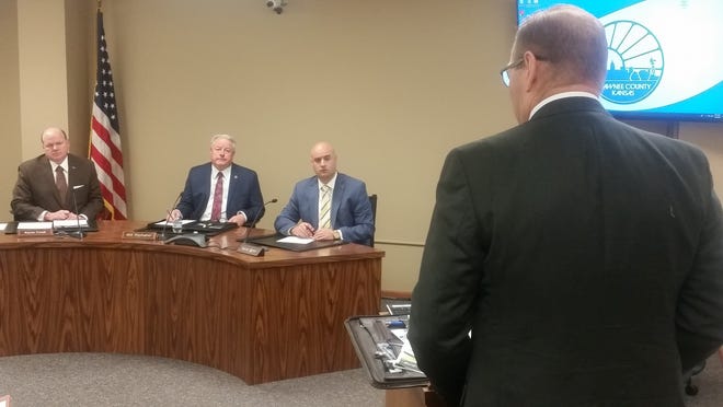 Shawnee County Commissioners, from left, Kevin Cook, Bill Riphahn and Aaron Mays hear Monday from county solid waste department director Bill Sutton. [Tim Hrenchir/The Capital-Journal]