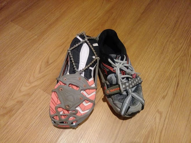 Yak Trax, which strap over your running shoes, can help you stay upright on snowy or icy days.