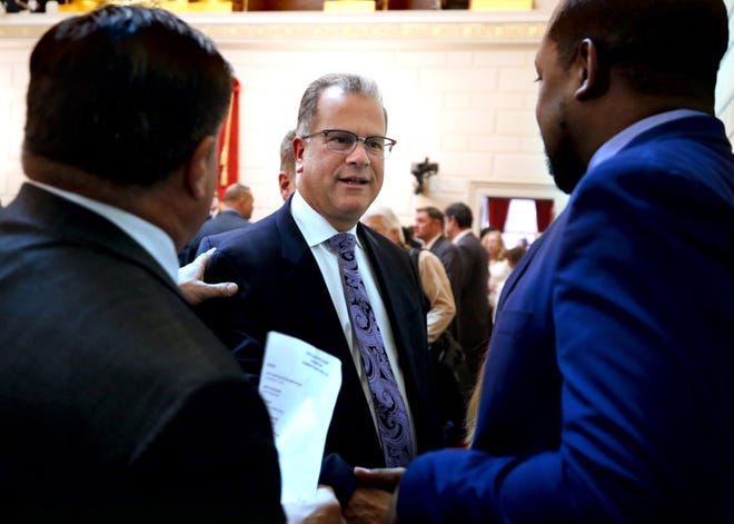 House Speaker Nicholas Mattiello greets guests in the House chamber before the start of a new legislative session on Tuesday afternoon. [The Providence Journal / Kris Craig]