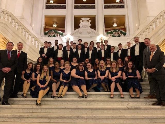Thirty-eight members of the Quakertown Community High School Varsity Singers recently were guests of Sen. Bob Mensch, far right, during a trip to the Pennsylvania State Capitol in Harrisburg. The choral group participated in a holiday concert event that included a performance attended by Gov. Tom Wolf. [CONTRIBUTED]