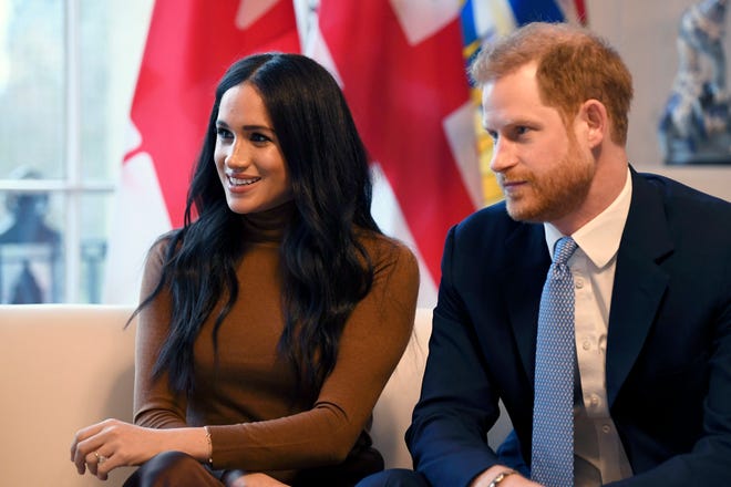 Prince Harry and his wife Meghan 'stepping back' as senior UK royals, will work to become financially independent, they announced Wednesday. [ASSOCIATED PRESS FILE PHOTO]