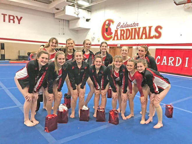 The Coldwater Cardinal Gymnastics team celebrated Parents Night and the Jillian Crist Memorial with their fourth straight Regional qualifying score.