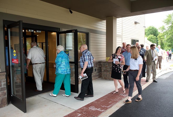 Guests tour Christ's Home Community Center on June 19, 2018, in Warminster. Christ’s Home is now planning another expansion in its retirement community of 30 apartments, two cottages and a new memory care facility to start construction in 2020. [BILL FRASER / PHOTOJOURNALIST]