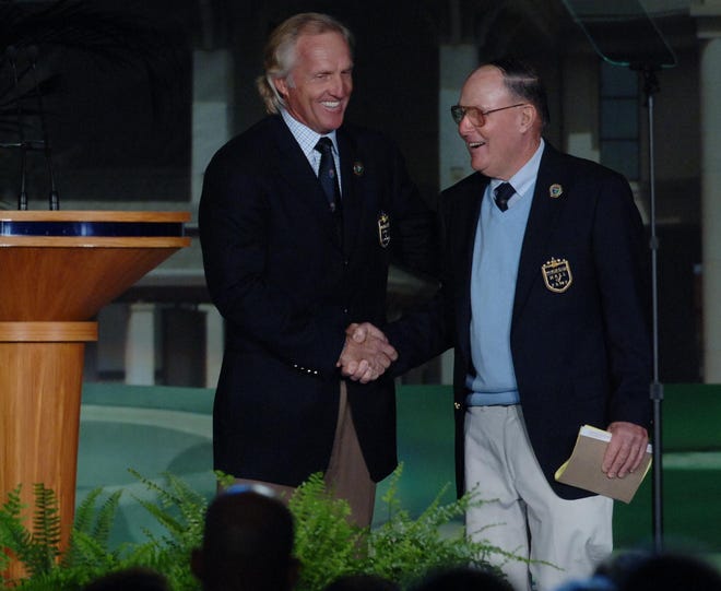 Greg Norman (left), who still holds the scoring record for The Players Championship at the TPC Sawgrass Players Stadium Course, shakes hands with designer Pete Dye as he is inducted into the The World Golf Hall of Fame in 2008. [FILE PHOTO]