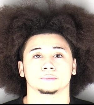 Alonzo Jerome Boyd Jr., 18, of Topeka, was booked into the Shawnee County Jail on Thursday morning in connection with an armed robbery and police chase that ended in East Topeka, authorities said. A 17-year-old boy was booked into the Shawnee County Juvenile Department of Corrections in connection with the same incident. [Submitted]
