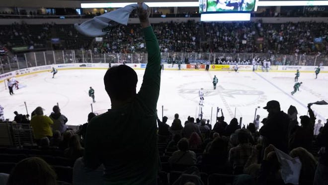 Texas Stars fans cheer as their team takes the ice in overtime against Rockford during Game 2 of the AHL Western Conference Finals in Cedar Park, Sunday, May 20, 2018. [Stephen Spillman / for Statesman]