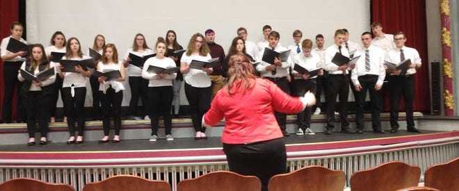 The Loudonville High School symphonic choir opened Thursday night's Redbird Resilient program about depression and suicide with a performance of a song about suicide, "Please Stay." Directing the choir is Rachel Kelly.