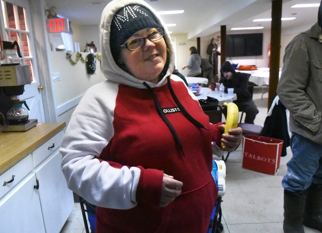 Jessica Covino has been homeless for a year and is grateful that St. George Maronite Church in Dover was a shelter Wednesday night so she and 28 other people could get warm and have a good meal. "I've never been homeless before and it's horrifying," she said. [Deb Cram/Fosters.com]