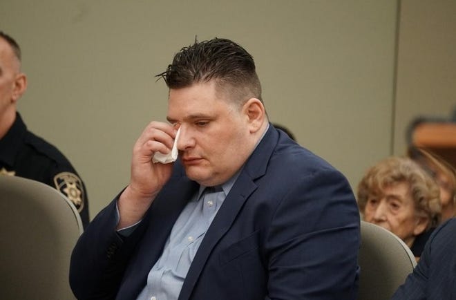 Ryan Beeley sheds tears as he listens to attorneys plead his case Friday. [The Providence Journal | Sandor Bodo]