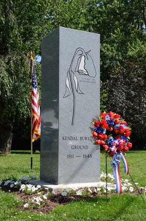 A monument, designed by architect John Patrick Picard, was dedicated by the Massillon Heritage Foundation last year. The monument marks the location of the Kendal Burying Ground. (IndeOnline.com / file photo)