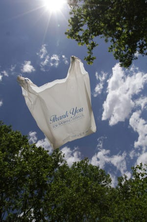 A plastic shopping bag blows in the wind. [PROVIDENCE JOURNAL FILE]