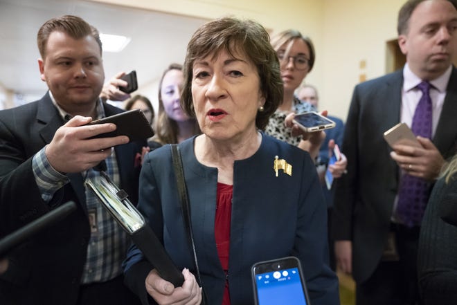 Sen. Susan Collins, R-Maine, is surrounded by reporters as she heads to vote at the Capitol in Washington in November 2019. [AP photo/J. Scott Applewhite, file]