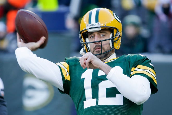Aaron Rodgers and the Green Bay Packers haven't been in the NFL playoffs since getting blown out by the Atlanta Falcons three years ago in the NFC championship game. [AP Photo/Mike Roemer]