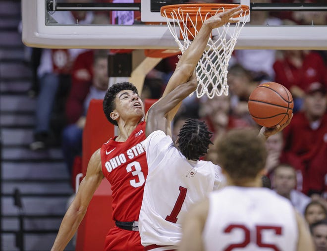Ohio State guard D.J. Carton, defending against Indiana's Al Durham, scored 10 points on 3-of-9 shooting from the field in the Buckeyes' 66-54 loss. But the freshman also committed seven turnovers. [Michael Hickey/Getty Images]
