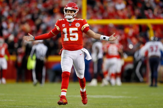 Kansas City Chiefs quarterback Patrick Mahomes (15) celebrates after throwing a touchdown pass during the second half of an NFL divisional playoff football game against the Houston Texans, in Kansas City, Mo., Sunday, Jan. 12, 2020. (AP Photo/Jeff Roberson)