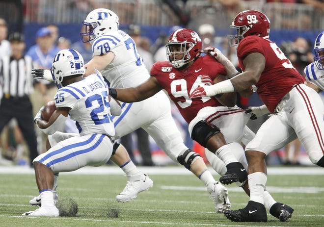 Alabama defensive lineman DJ Dale (94) helps to bring down Duke running back Deon Jackson (25) during the first half of the Crimson Tide’s season opener Saturday, Aug. 31, 2019. [Staff Photo/Gary Cosby Jr.]