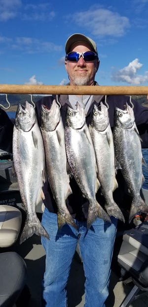 Steve Ramsey of Yuba City landed this limit of hefty landlocked king salmon while trolling with Brad’s Kokanee Cut Plugs at Lake Oroville on Jan. 6. [RUSTIC ROB'S GUIDE SERVICE]