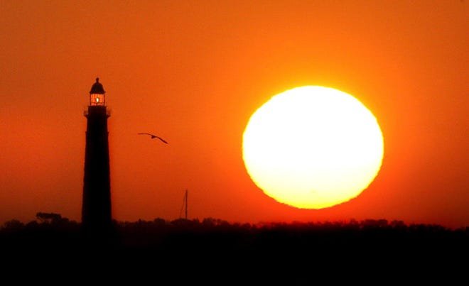 Sunrise near the Ponce Inlet Lighthouse. [News-Journal/Jim Tiller]