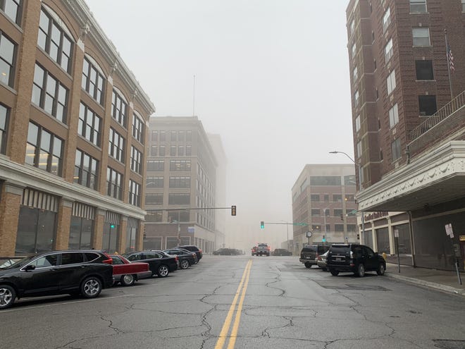 Fog had rolled into downtown Topeka by 8:50 a.m. Tuesday, limiting visibility to about a block. A dense fog advisory was in effect until 10 a.m. Tuesday. Another round of fog is possible early Wednesday, according to the National Weather Service. [Phil Anderson/The Capital-Journal]