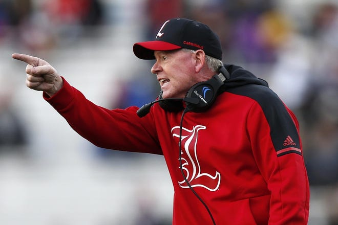 FILE - In this Oct. 13, 2018, file photo, then-Louisville head coach Bobby Petrino argues a call during the second half of an NCAA college football game against Boston College, in Boston. Petrino, a coach with a track record of on-the-field success but off-the-field embarrassments, will be the next coach at Missouri State, the university said Wednesday, Jan. 15, 2020. (AP Photo/Michael Dwyer, File)