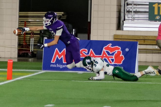 Pickford's Nick Edington reaches for the end zone during the state championship game against Portland St. Patrick at the Superior Dome in Marquette. Edington has verbally committed to play football at Northern Michigan University. [Courtesy of Angel Portice 2BU Photography]