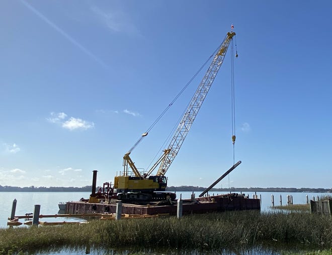 Concrete pilings in Lake Dora damaged by Hurricane Irma are being removed to make way for the construction of a bigger, better and safer seaplane base and marina Tavares officials estimate will be finished in about one year. [Roxanne Brown/Daily Commercial]