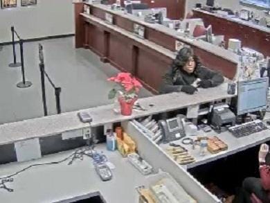 Hendersonville Police are seeking information on a man suspected of robbing a BB&T bank in the city on Thursday. [Photo submitted]