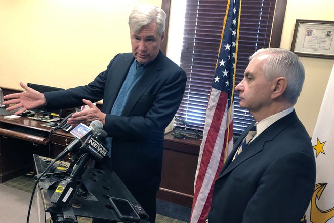 U.S. Sens. Sheldon Whitehouse, left, and Jack Reed discuss the impeachment trial of President Donald Trump Friday, Jan. 17, 2020, at Reed's office in Cranston, R.I. The Rhode Island Democrats spoke about the importance of calling witnesses for the trial. [JENNIFER MCDERMOTT/AP PHOTO]