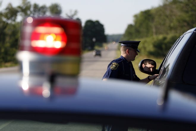 Nearly 40 of Michigan's 203 desktop alcohol-breath devices have been returned to service, the state police director said Thursday as he updated lawmakers on an investigation that could raise questions about some drunken driving cases. [Sentinel file]
