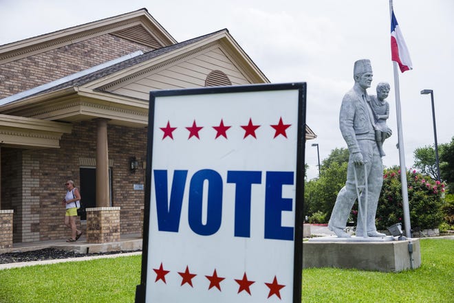 A sign greets voters at the Ben Hur Shrine Center polling station in Austin on May 14, 2018. [AMANDA VOISARD / AMERICAN-STATESMAN / FILE]