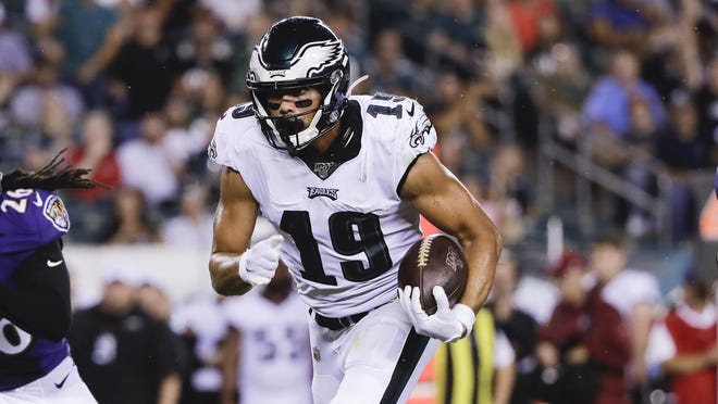 Eagles wide receiver JJ Arcega-Whiteside runs with the ball after catching a pass in the preseason. [MATT ROURKE / ASSOCIATED PRESS FILE]