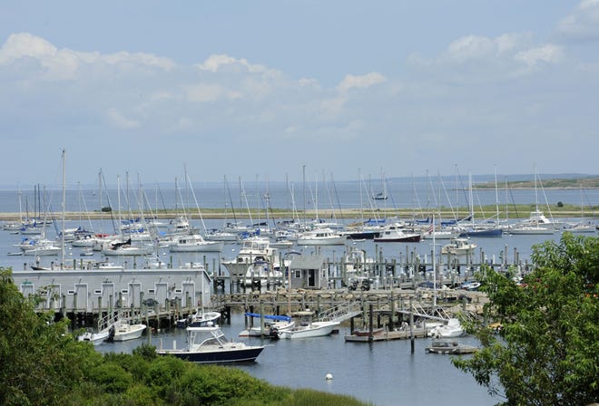 Boats sit moored off Cuttyhunk Island. Gosnold town officials are concerned with how state and federal fines levied against R.M. Packer Co. could impact fuel delivery to the island. [Cape Cod Times file]