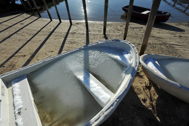 Ice bound skiffs at the Barn Hill Road town landing in Chatham on a recent day.