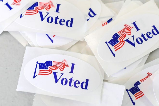 These "I Voted" stickers were available at a polling station on the campus of the University of California, Irvine, in 2018. Rhode Island is looking for its own unique ‘I voted’ design to be used for the upcoming presidential election. [Robyn Beck/AFP/Getty Images via TNS]