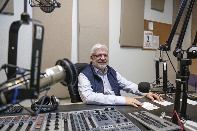 Federico Pacheco, who worked for years in radio in his native Venezuela, took over as the station manager for KOOP Radio a year ago. After years spent working in advertising, he welcomed the opportunity to return to radio. [JAMES GREGG/AMERICAN-STATESMAN]