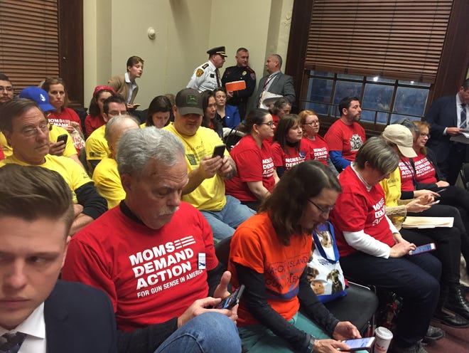 Supporters and opponents of gun-control legislation attend Wednesday's House Judiciary Committee hearing at the State House. [The Providence Journal / Katherine Gregg]