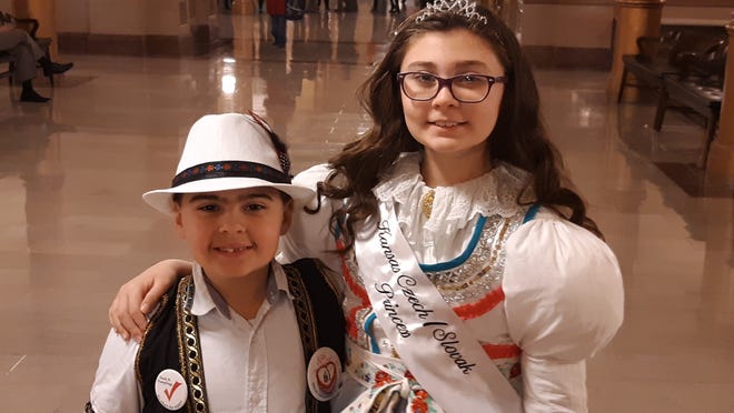 Ellsworth siblings, from left, Remy and Brooklyn Webb joined Thursday with advocates of a bill under consideration by the Senate Federal and State Affairs Committee to declare polka the state's official dance. [Tim Carpenter/The Capital-Journal]