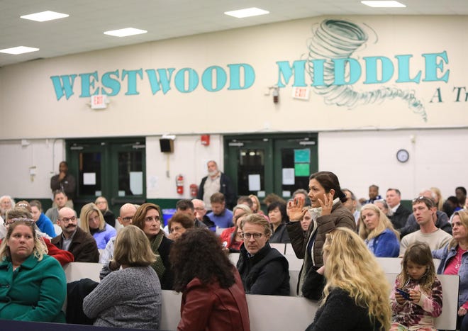 Residents voice concerns during a Dec. 3 public meeting about a proposed swing school at Westwood Middle School, which would house displaced students from Howard Bishop Middle School while it is under construction. [The Gainesville Sun, File]